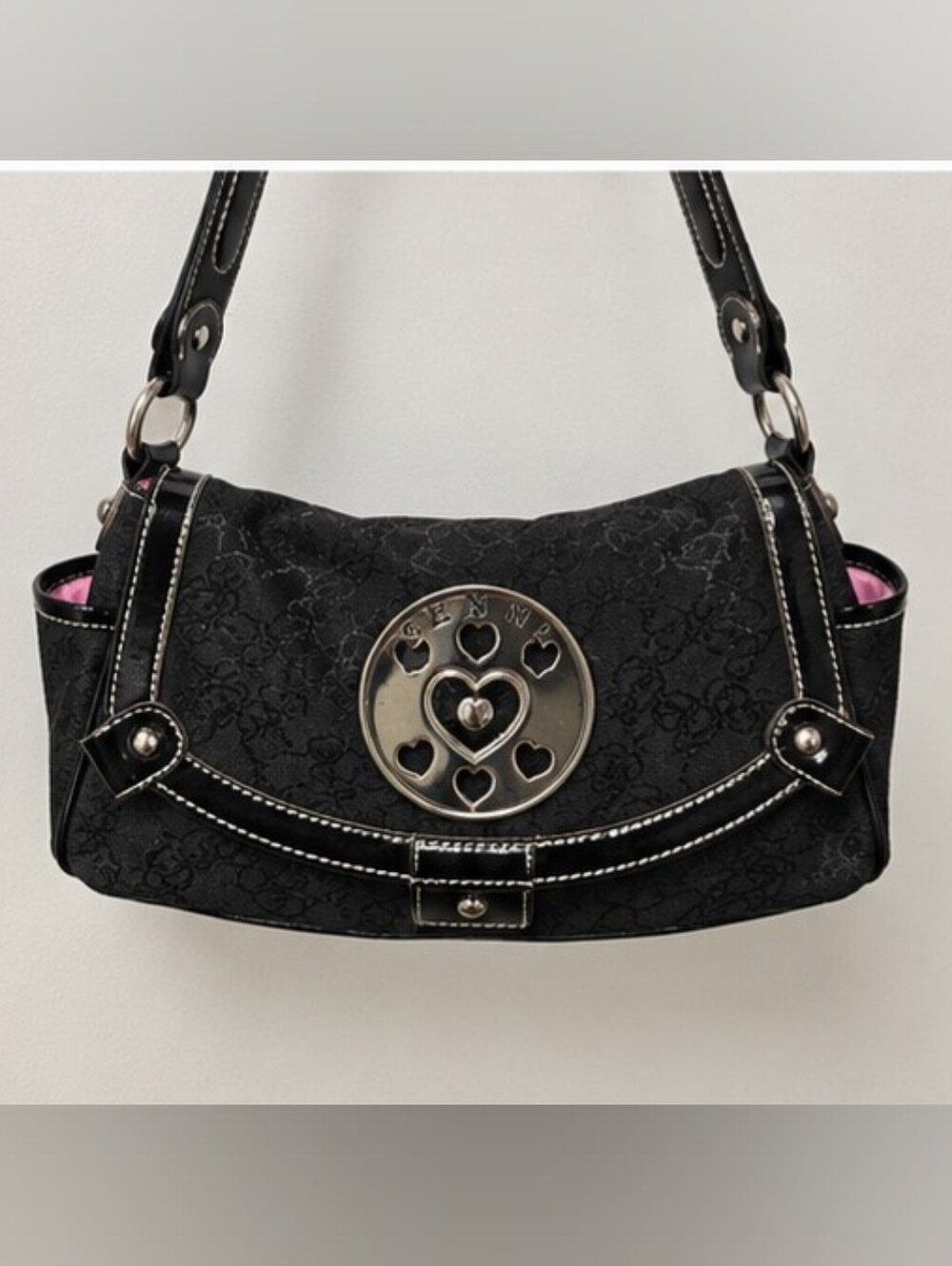 Black Shoulder Bag with Heart Medallion Accent